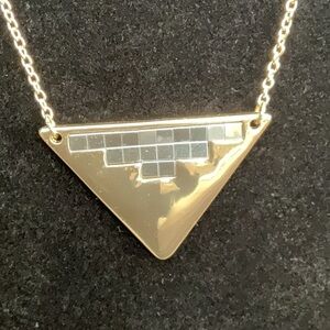 Gold - tone Pyramid style necklace.